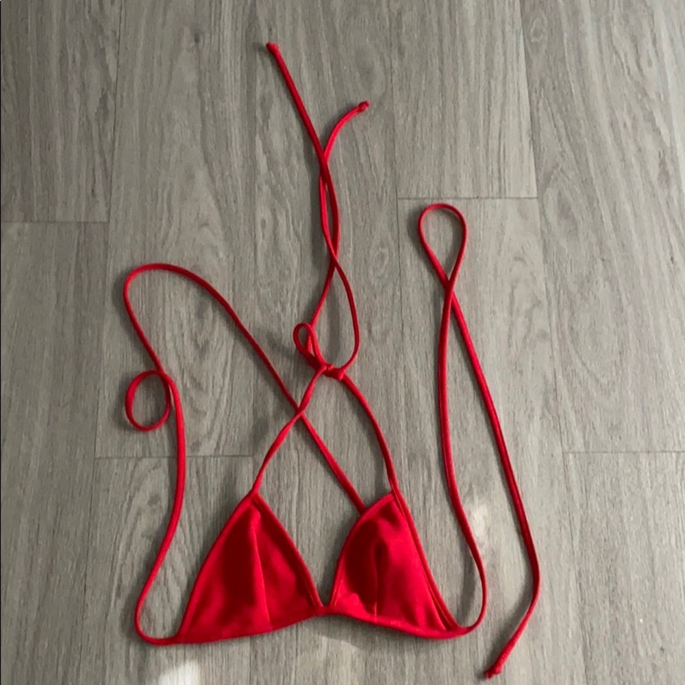 Cute red bikini top .